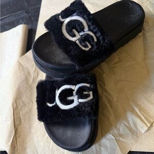 UGG Black Fur Slide Sandals with Logo like new, worn in home only.